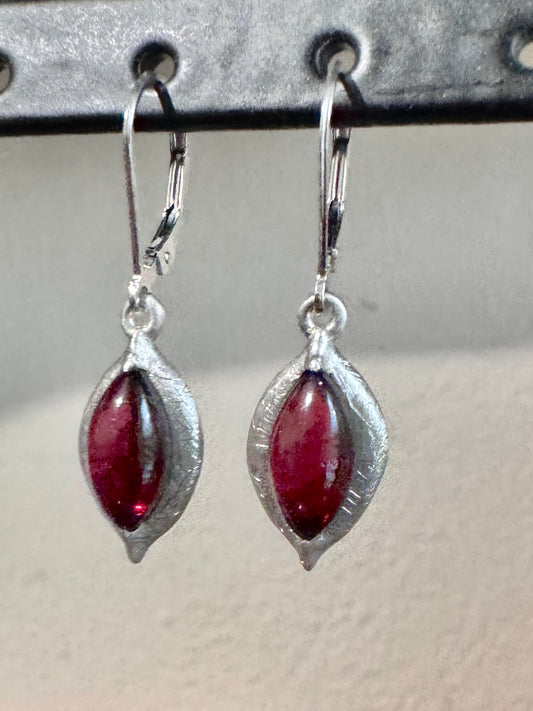 Sterling silver marquise garnet cabochon dangly earring with a sparking textures finish